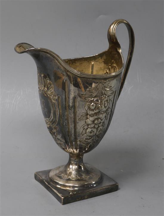 A George III silver helmet-shaped cream jug,
